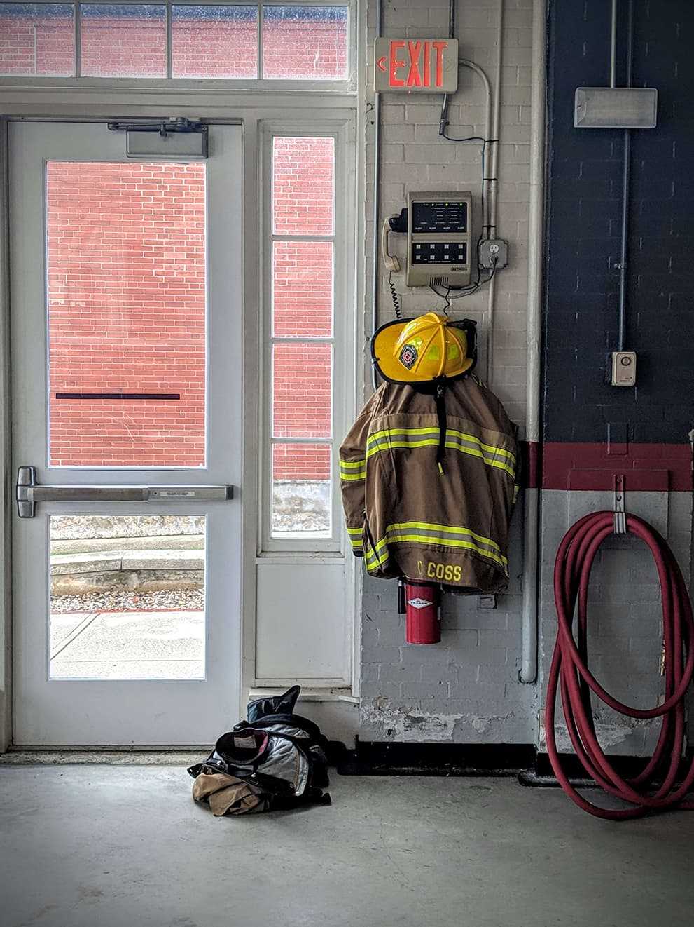WFD firefighter gear hanging on a hook